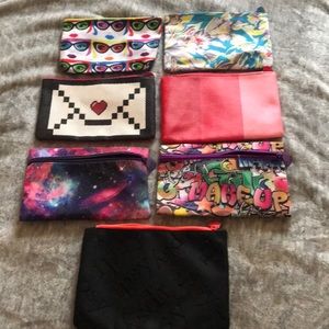 7 ipsy makeup bags!